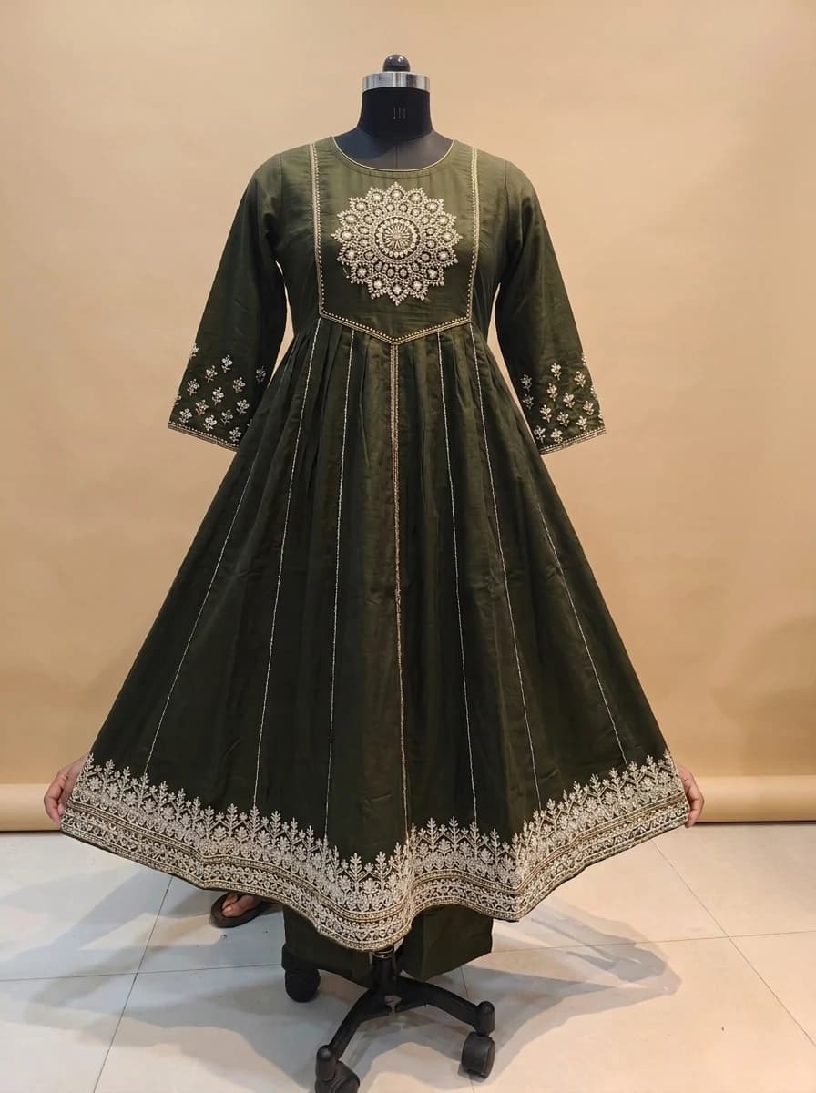 Before: original green embroidered garment reference