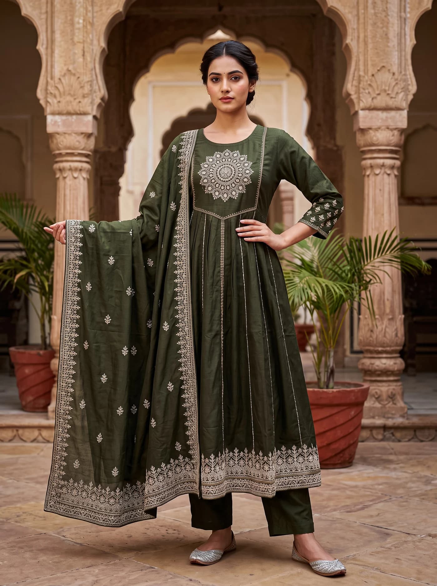 After: model wearing the finished embroidered green outfit